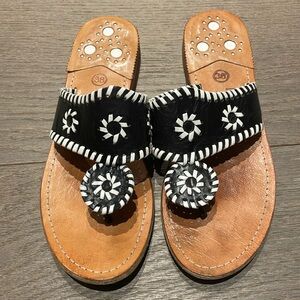 Black and white leather sandal with tan leather sole